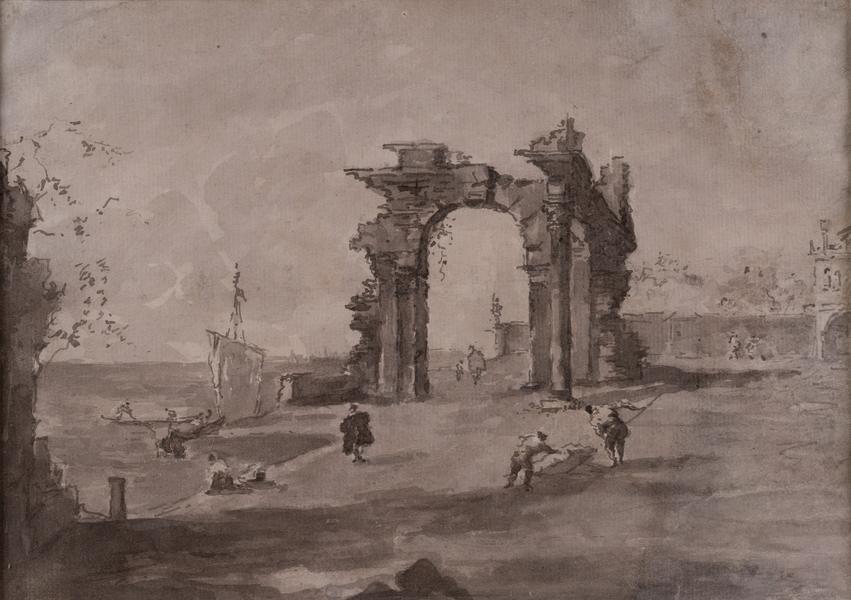 The ruins of the arch on the shore of the lagoon