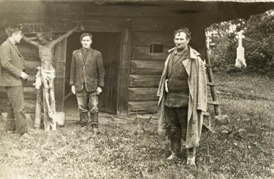 Two Older Men in Front of the Entry Elements — unknown
