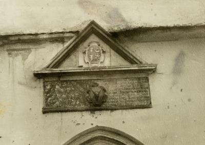 Table with the Coat of Arms Above the Portal — unknown
