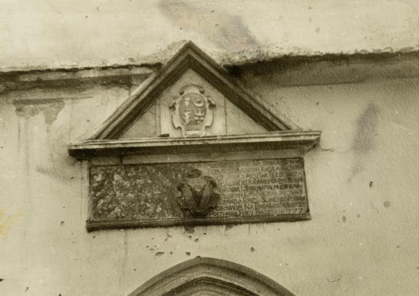 Table with the Coat of Arms Above the Portal