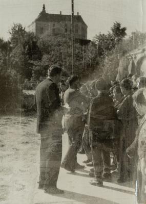 Group of People Near the Olesko Castle — unknown