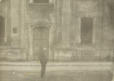 Volodymyr Ovsiichuk in Front of the Facade of the Church of the Immaculate Conception of the Virgin Mary — unknown