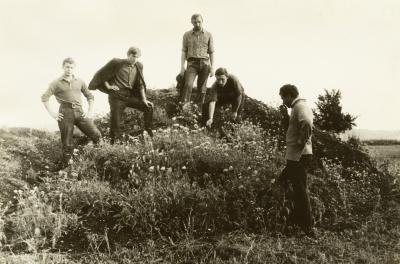 Group of Young People Posing Against the Backdrop of the Landscape — unknown
