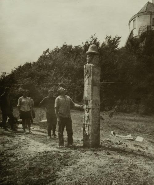 Volodymyr Ovsiichuk Next to a Copy of the Zbruch Idol Svitovid at the Foot of the Olesko Castle