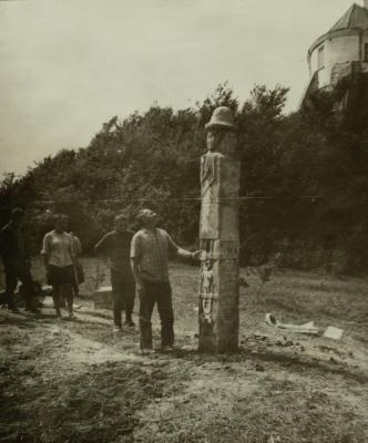 Volodymyr Ovsiichuk Next to a Copy of the Zbruch Idol Svitovid at the Foot of the Olesko Castle — unknown